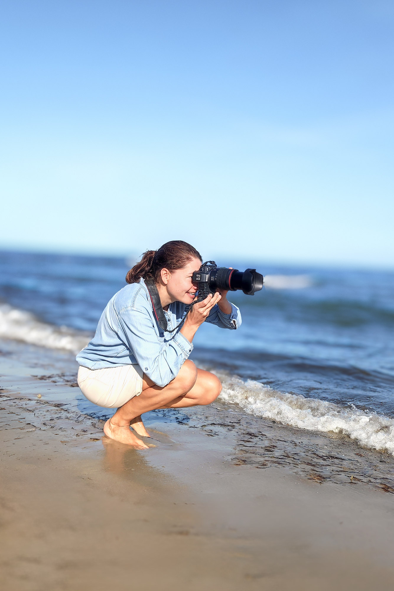 Anne-Kapries Fotografin bei der Arbeit am Strand